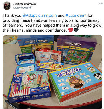 A photo of a Tweet that includes a photo of school supplies.
