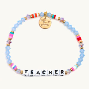 A photo of a Little Words Project Bracelet that says "Teacher"